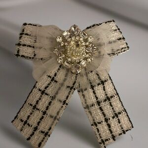 Upscaled Elegant Cream and Black Bow Brooch